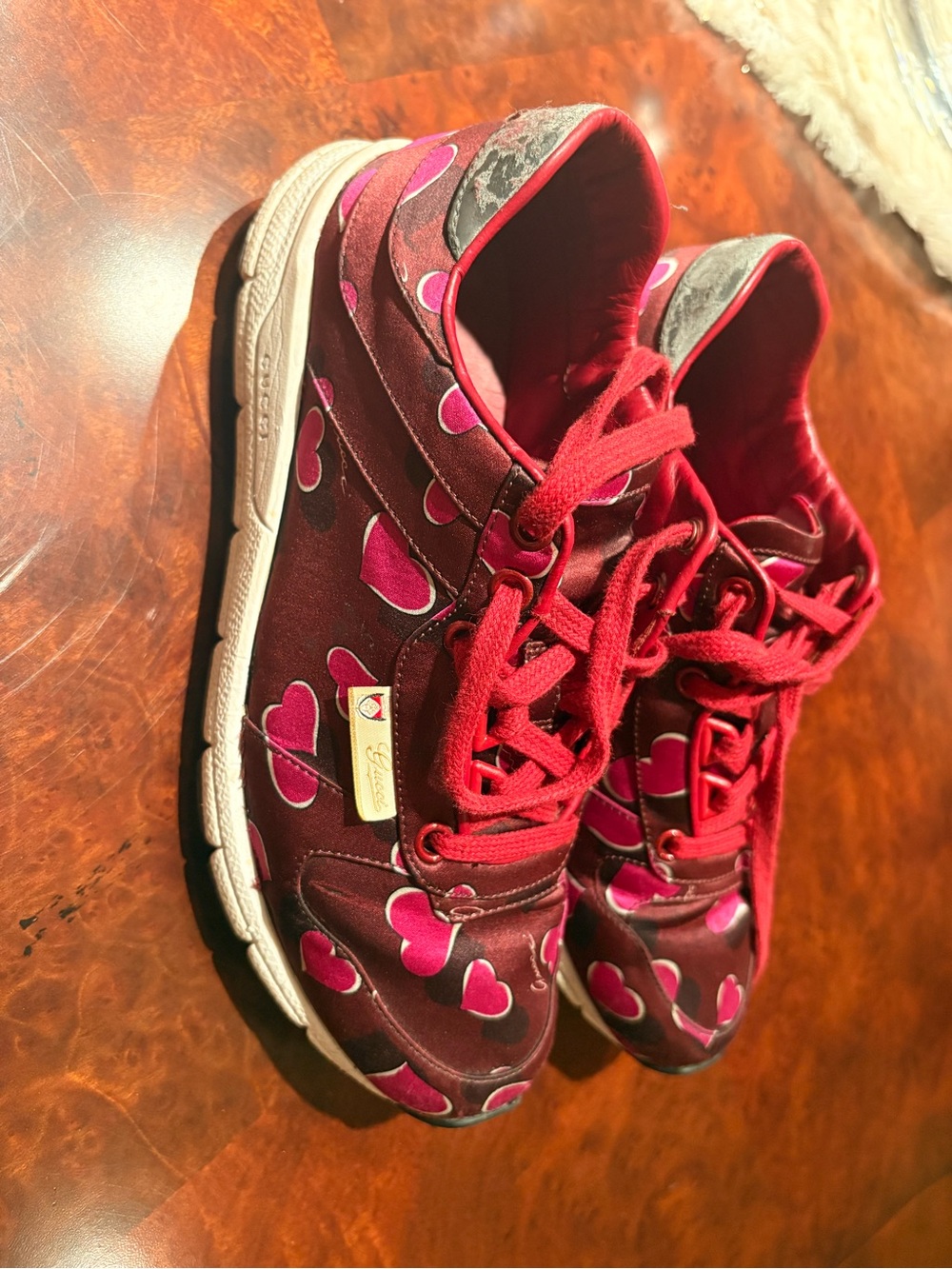 Gucci women’s Burgundy Sneakers with Pink Heart Print